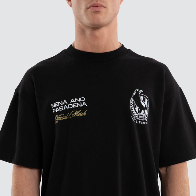 Model wears Colingwood Magpies AFL Advance Raptor Tee Jet Black T-Shirts in Black - Image 7