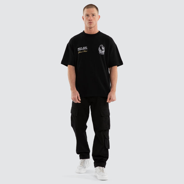 Model wears Colingwood Magpies AFL Advance Raptor Tee Jet Black T-Shirts in Black - Image 6
