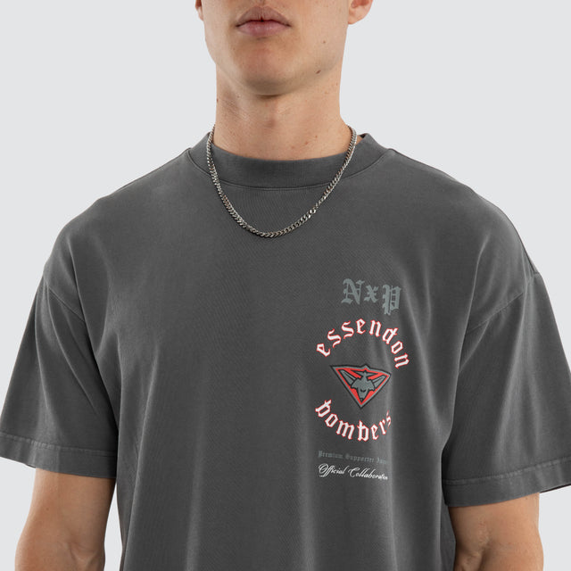 Model wears Essendon Bombers AFL Off-Season Tee Pigment Grey T-Shirts in Grey - Image 3