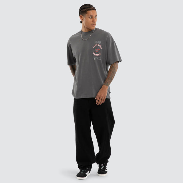 Model wears Essendon Bombers AFL Off-Season Tee Pigment Grey T-Shirts in Grey - Image 5