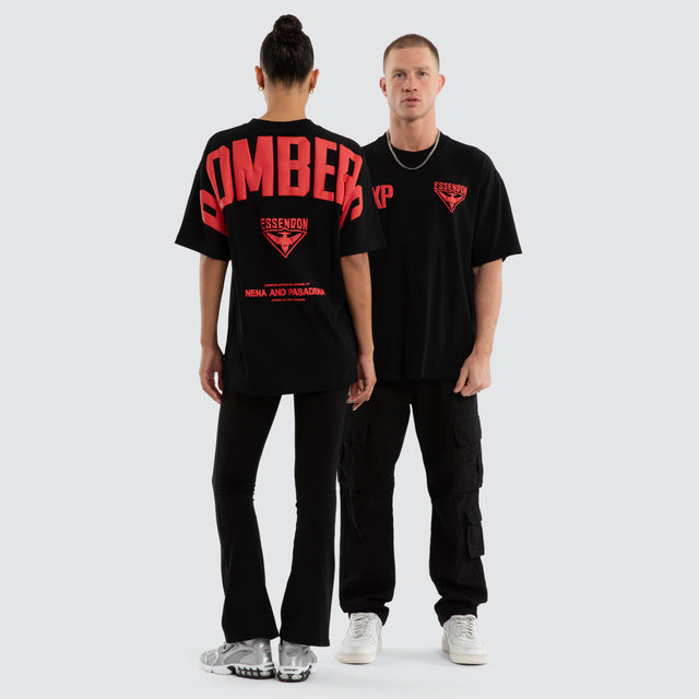 Model wears Essendon Bombers AFL Archive Raptor Tee Jet Black T-Shirts in Black - Image 4