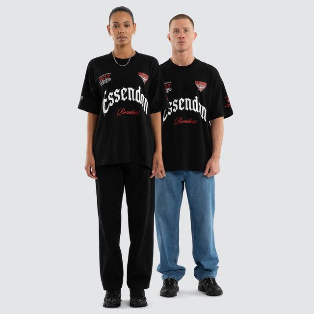 Model wears Essendon Bombers AFL Gold Raptor Tee Jet Black T-Shirts in Black - Image 5