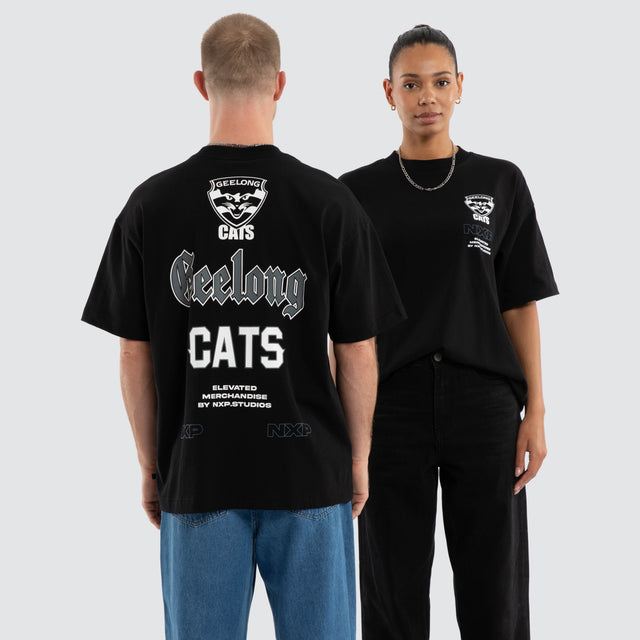 Model wears Geelong Cats AFL Sticker Raptor Tee Jet Black T-Shirts in Black - Image 1