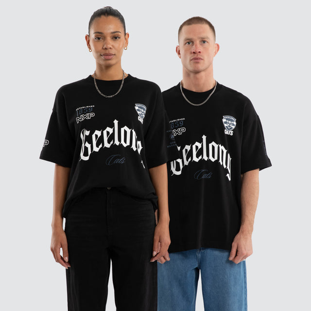 Model wears Geelong Cats AFL Gold Raptor Tee Jet Black T-Shirts in Black - Image 1