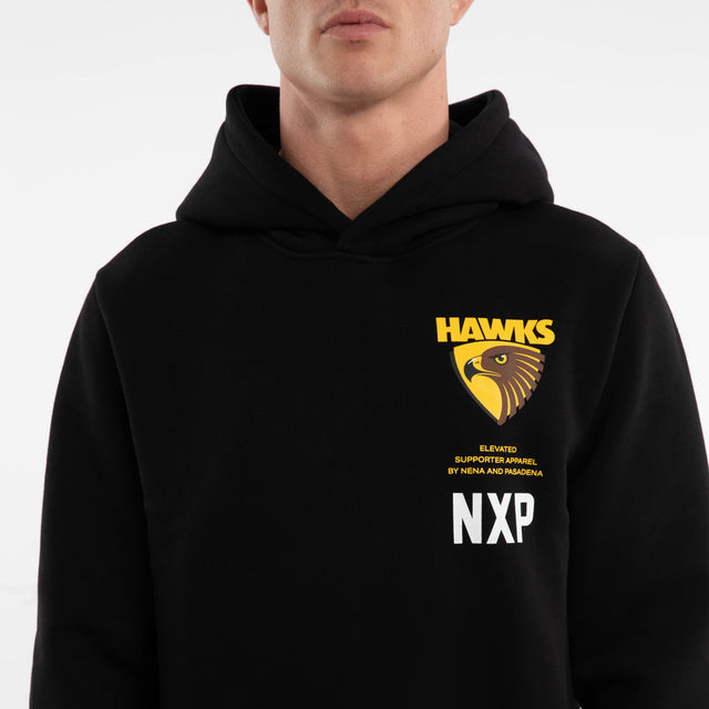 Model wears Hawthorn Hawks AFL Trophy Curved Hem Hoodie Jet Black Hoodies in Black - Image 3