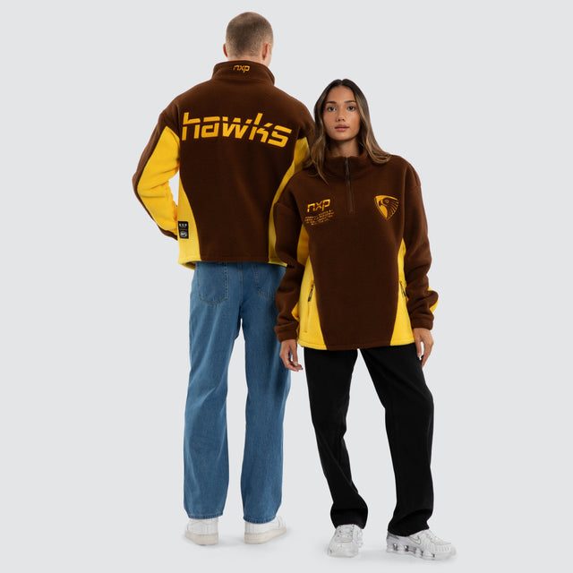 Model wears Hawthorn Hawks AFL Defence Pullover Brown & Yellow Jumpers in Brown - Image 5