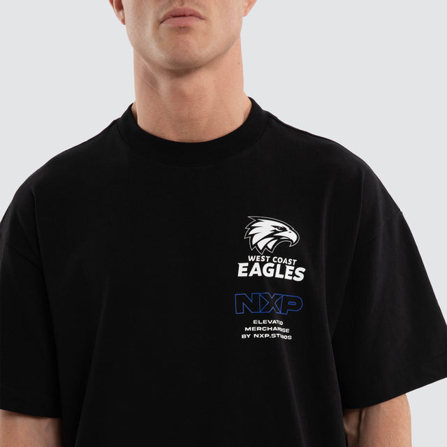 Model wears West Coast Eagles AFL Sticker Raptor Tee Jet Black T-Shirts in Black - Image 5