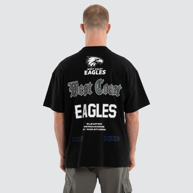 Model wears West Coast Eagles AFL Sticker Raptor Tee Jet Black T-Shirts in Black - Image 2
