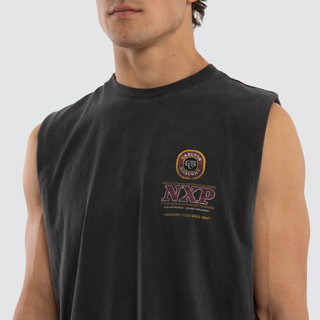 Model wears Carlton Draught Comical Relaxed Muscle Tee in Pigment Black Muscle Tees in Black - Image 3