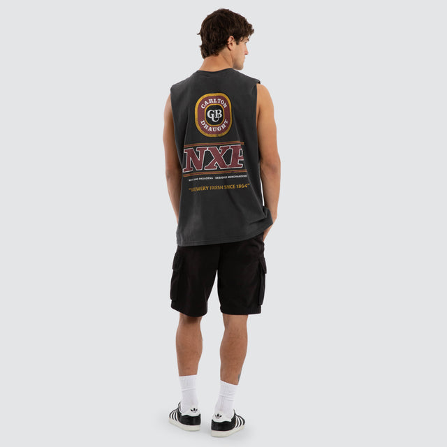 Model wears Carlton Draught Comical Relaxed Muscle Tee in Pigment Black Muscle Tees in Black - Image 4