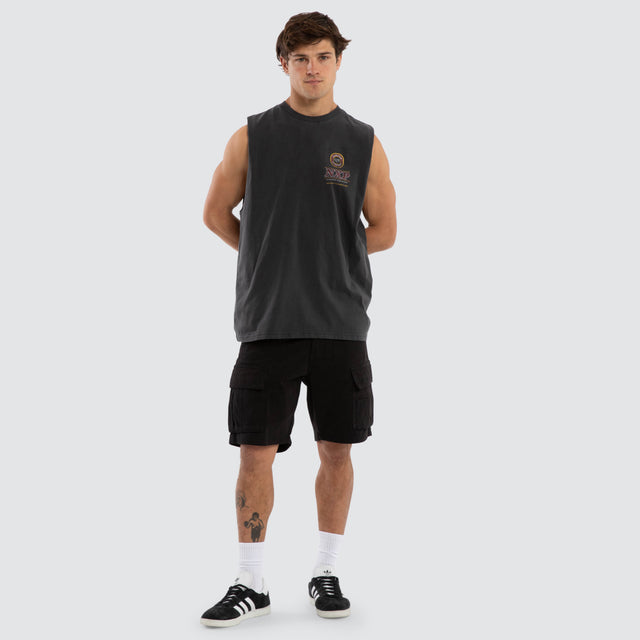 Model wears Carlton Draught Comical Relaxed Muscle Tee in Pigment Black Muscle Tees in Black - Image 5