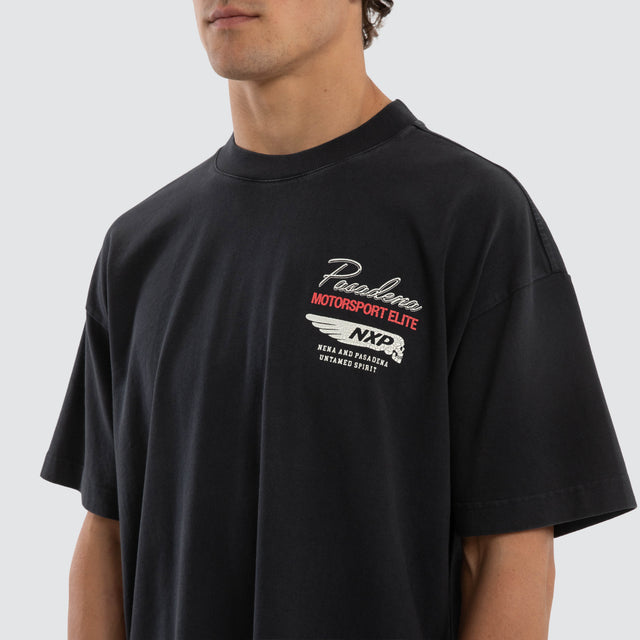 Model wears Downforce Raptor Tee Pigment Anthracite Black T-Shirts in Black - Image 4