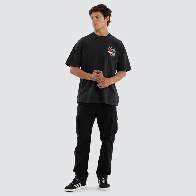 Model wears Downforce Raptor Tee Pigment Anthracite Black T-Shirts in Black - Image 6