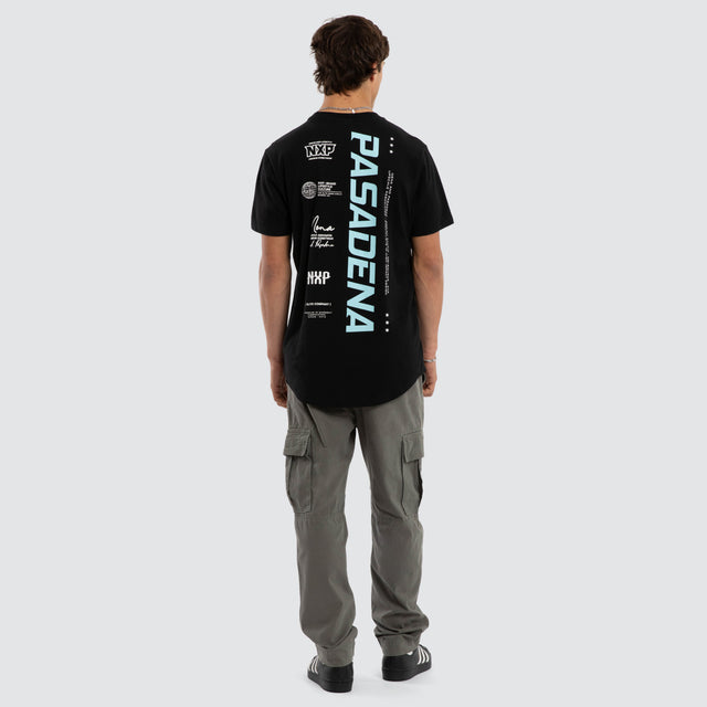 Model wears System Curved Hem T-Shirt Black  T-Shirts in Black - Image 4