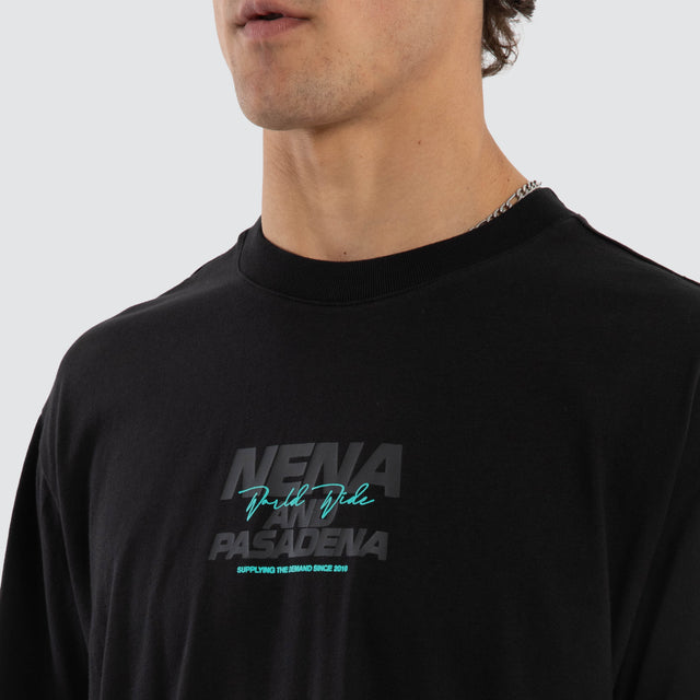 Model wears Hybrid Box Fit Tee Black  T-Shirts in Black - Image 3