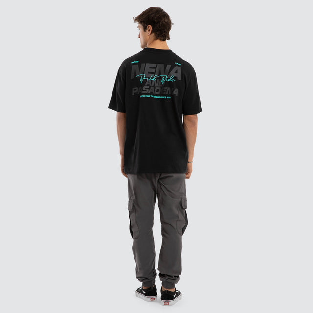 Model wears Hybrid Box Fit Tee Black  T-Shirts in Black - Image 4
