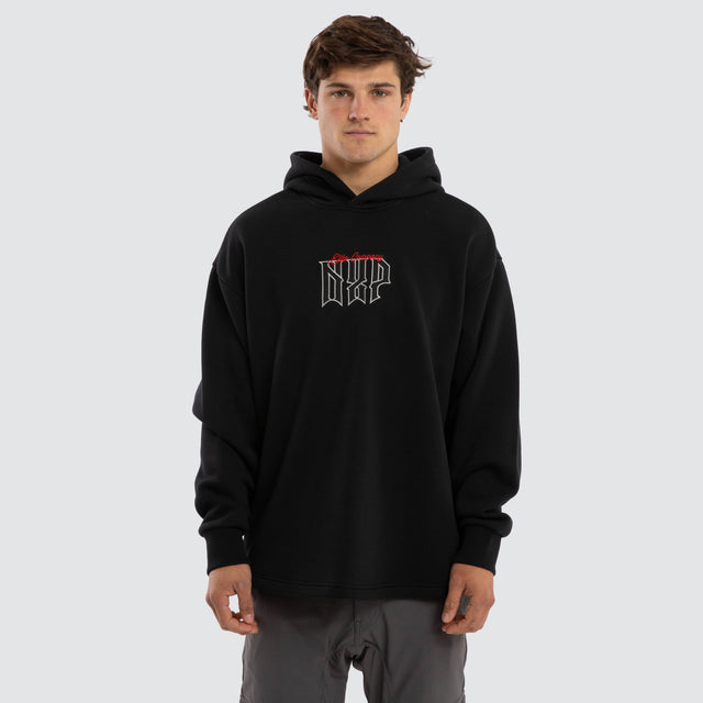 Model wears Motion Relax Curved Hem Hoodie Black  Hoodies in Black - Image 1