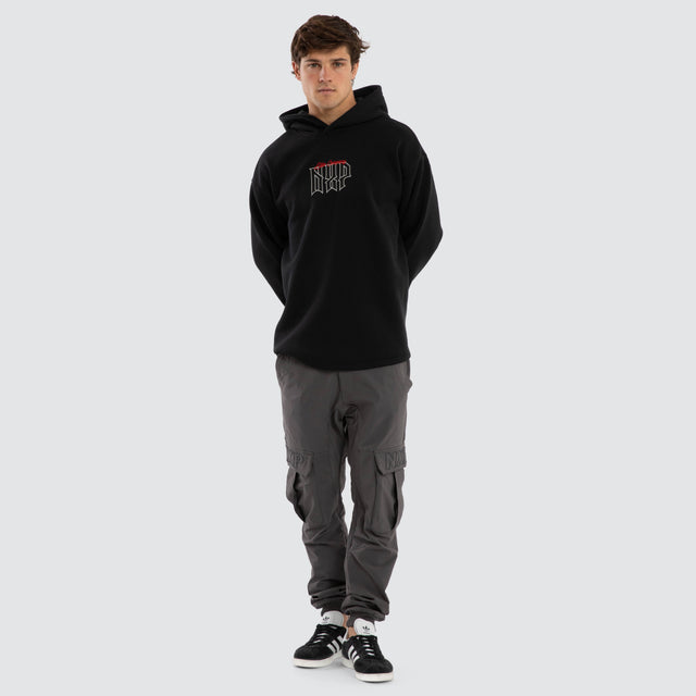 Model wears Motion Relax Curved Hem Hoodie Black  Hoodies in Black - Image 4