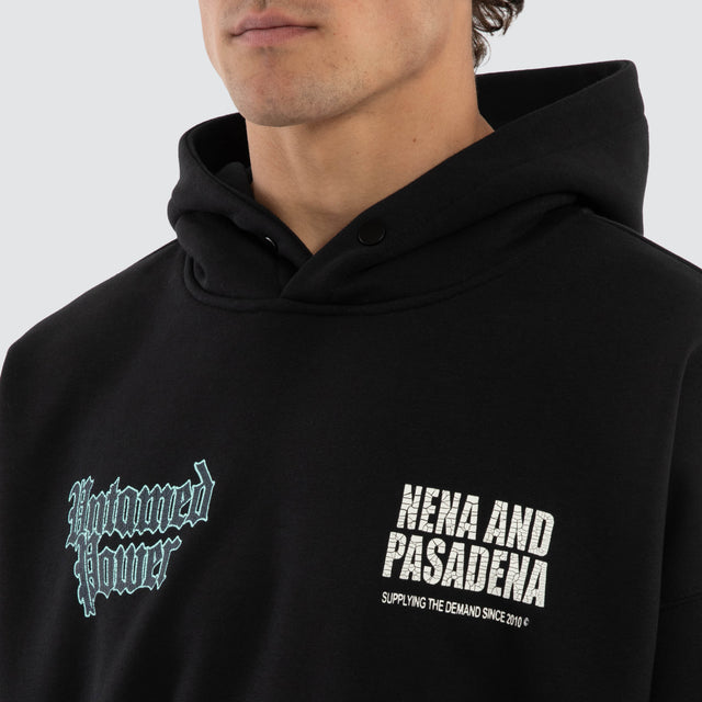 Model wears Mercy Box Fit Hoodie Black  Hoodies in Black - Image 3
