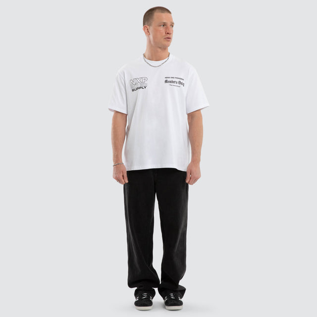 Model wears Dominant Classic Tee Optical White T-Shirts  – image 2