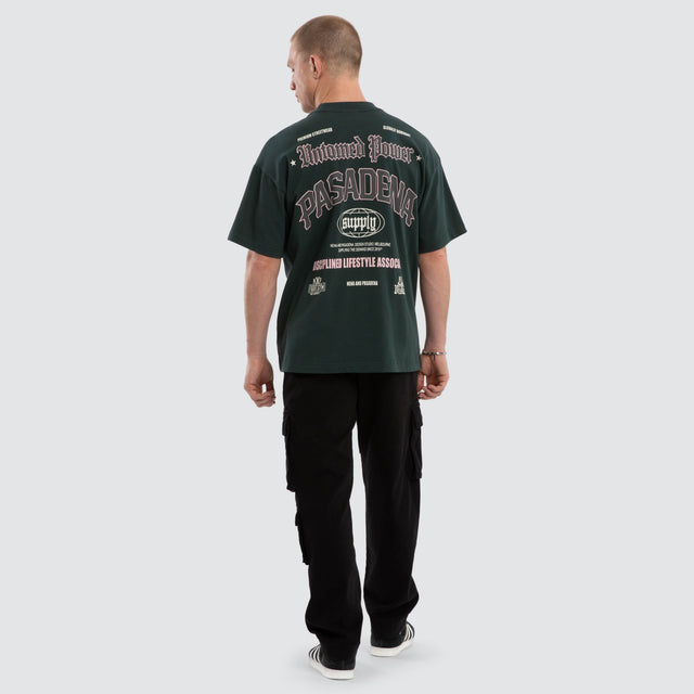 Model wears Mercy Raptor Tee Green T-Shirts in Green - Image 4
