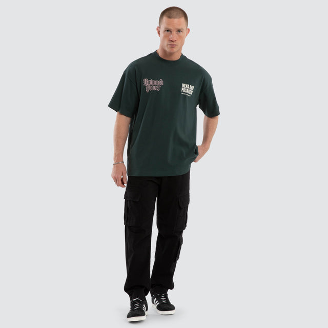 Model wears Mercy Raptor Tee Green T-Shirts in Green - Image 5