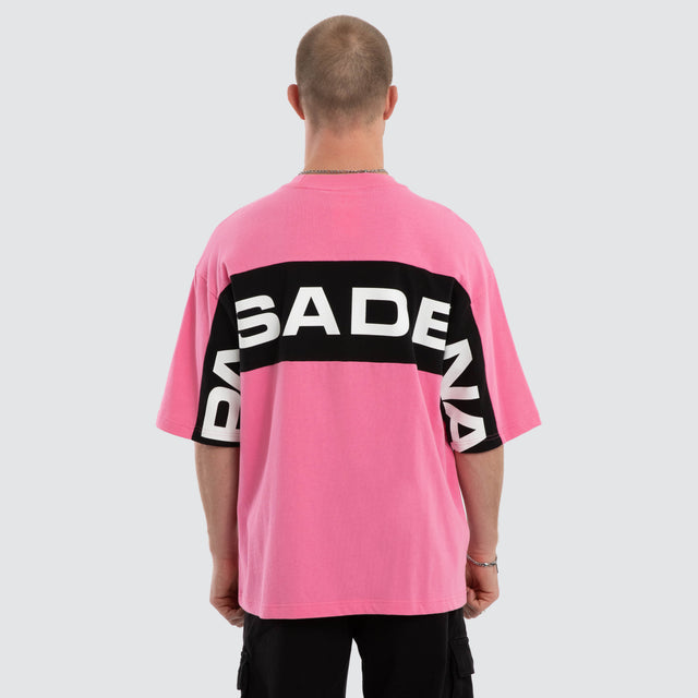 Model wears Grand Box Fit T-Shirt Pink and Black  T-Shirts in Pink - Image 2