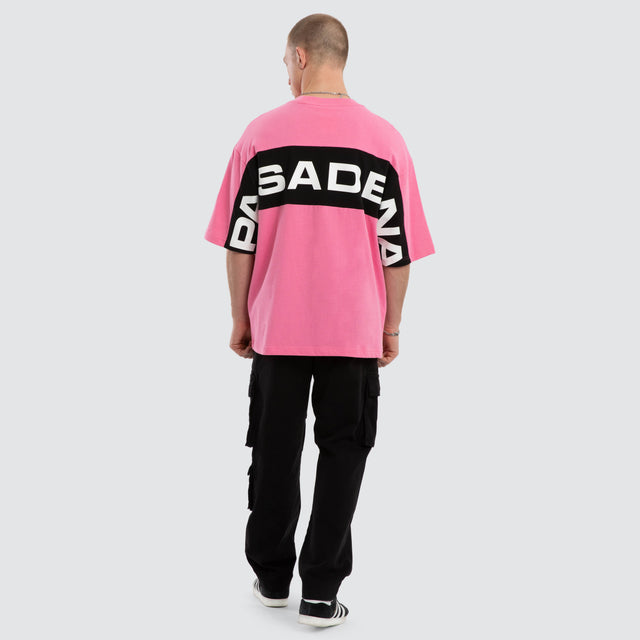 Model wears Grand Box Fit T-Shirt Pink and Black  T-Shirts in Pink - Image 4