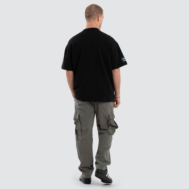 Model wears Drive Loopback Raptor Tee Jet Black T-Shirts in Black - Image 4