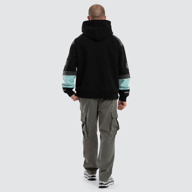 Model wears Wordly Relaxed Hoodie Jet Black Hoodies  – image 2