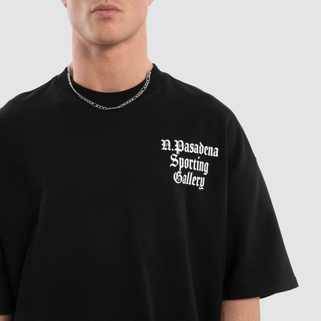 Model wears Outlap Gallery Tee Black  T-Shirts in Black - Image 3