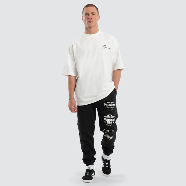 Model wears Parade Trackpant Pigment Black  Trackpants in Black - Image 3