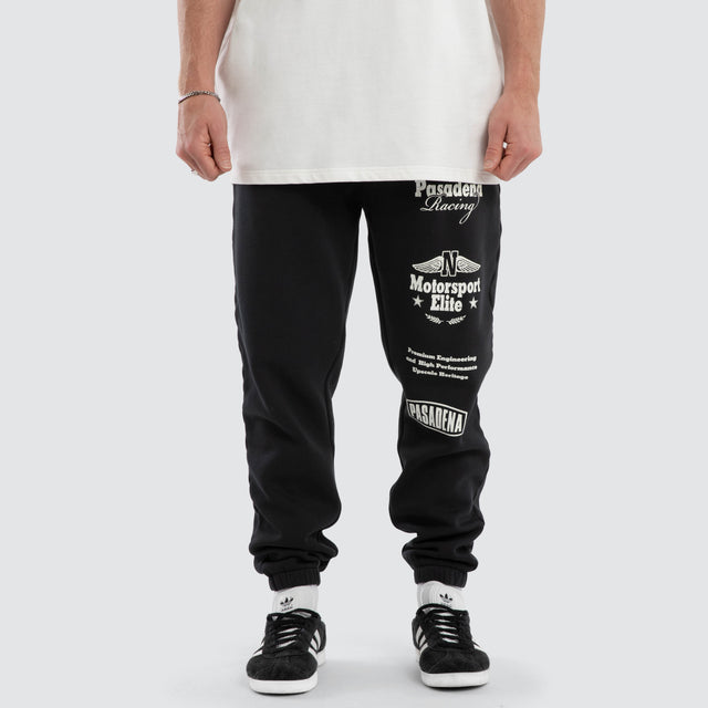 Model wears Parade Trackpant Pigment Black  Trackpants in Black - Image 4