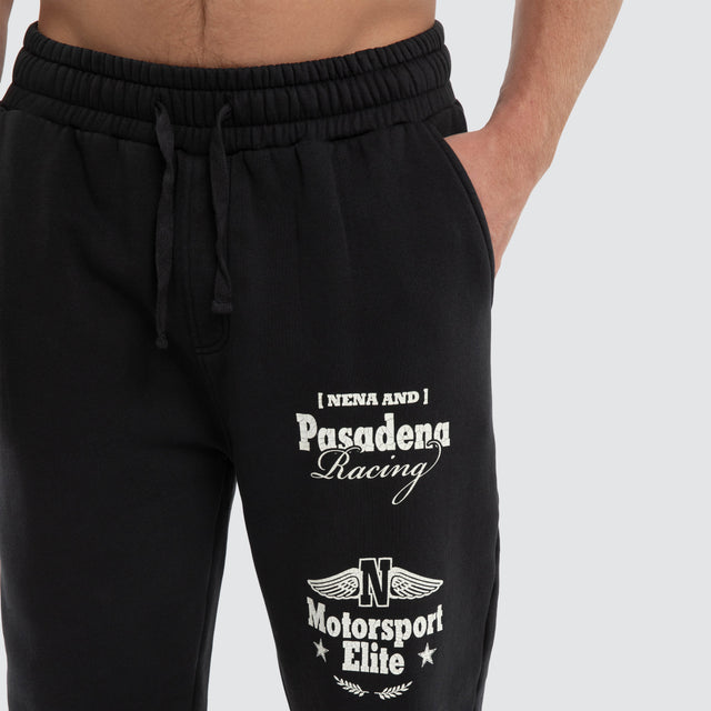 Model wears Parade Trackpant Pigment Black  Trackpants in Black - Image 2