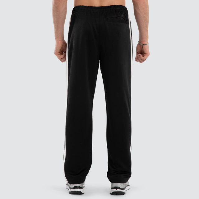Model wears Turbo Sport Pant Jet Black  Pants in Black - Image 5