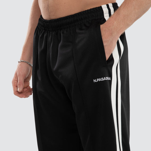 Model wears Turbo Sport Pant Jet Black  Pants in Black - Image 2