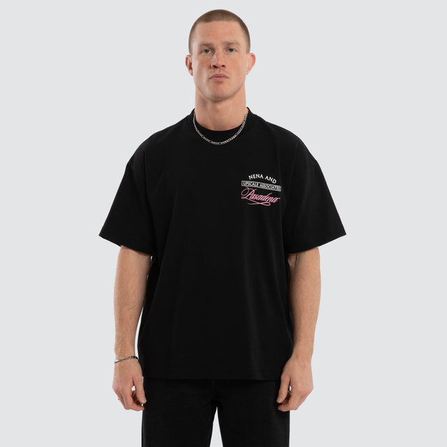 Model wears Balance Box Fit T-Shirt Black  T-Shirts in Black - Image 1