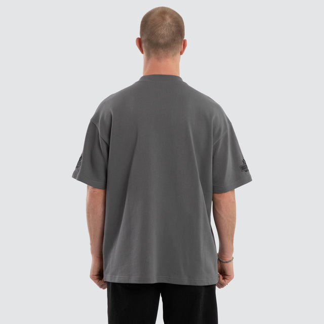 Model wears Victory Loopback Raptor Tee Charcoal  T-Shirts in Grey - Image 3
