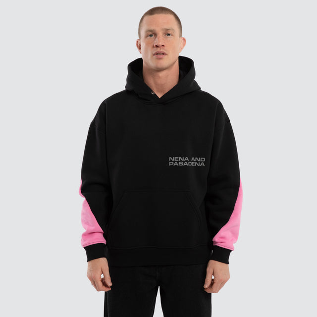 Model wears Zone Box Fit Hoodie Black and Pink  Hoodies in Black - Image 1