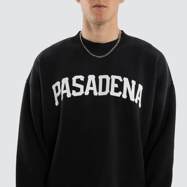 Model wears Halo Box Fit Sweater Sunbleached Black Jumpers in Black - Image 3