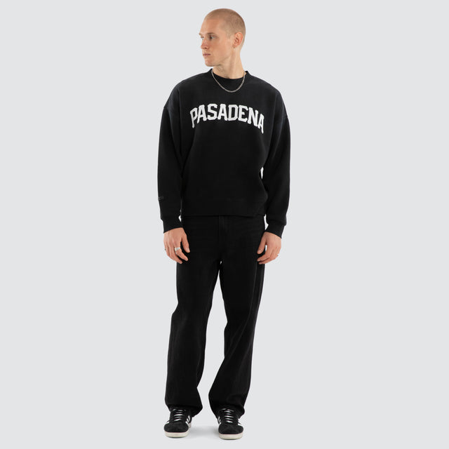 Model wears Halo Box Fit Sweater Sunbleached Black Jumpers in Black - Image 5