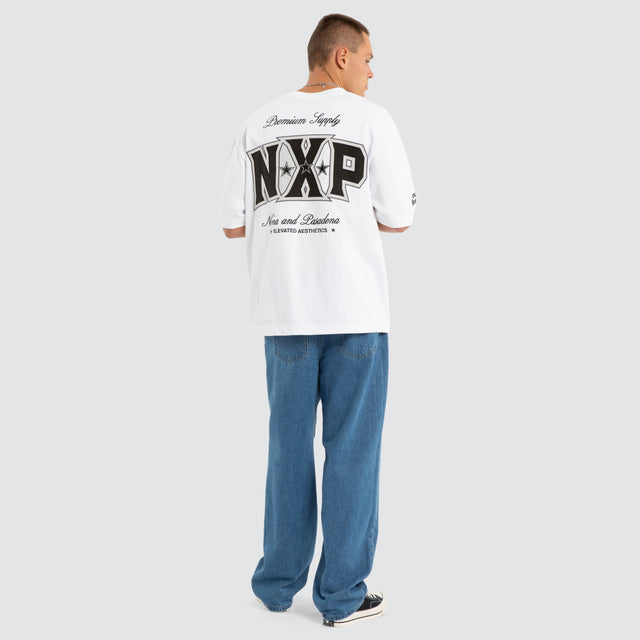 Model wears Authority Oversized Tee Optical White T-Shirts in White - Image 4