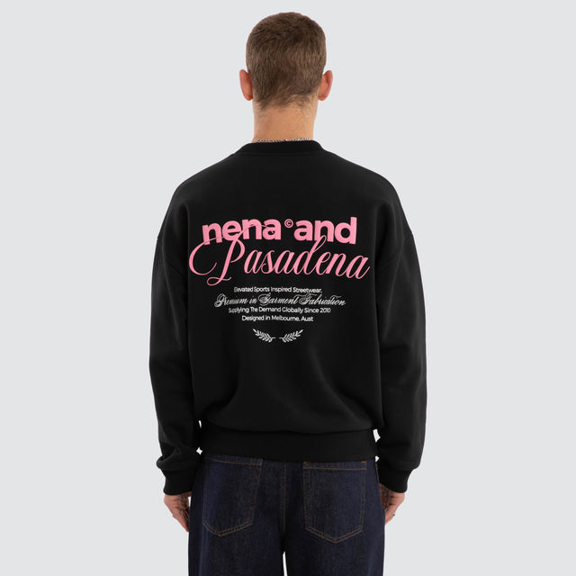 Model wears Limitless Box Fit Sweater Anthracite Black Jumpers in Black - Image 1