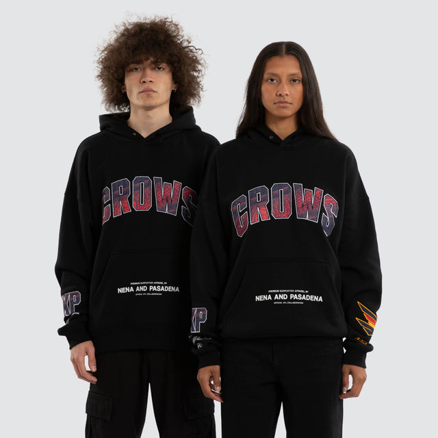Model wears Ben Davis Adelaide Crows AFL Box Fit Hoodie Jet Black Hoodies in Black - Image 1