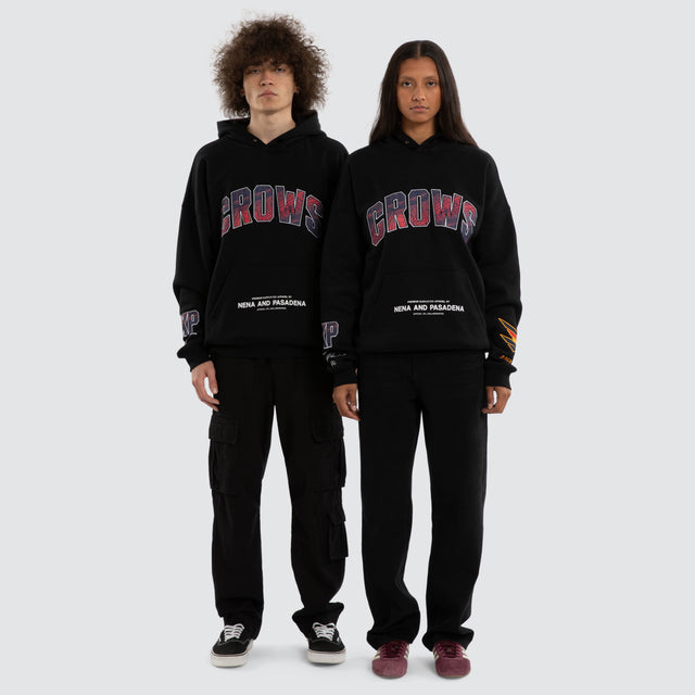 Model wears Ben Davis Adelaide Crows AFL Box Fit Hoodie Jet Black Hoodies in Black - Image 3