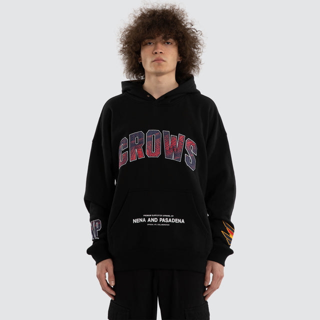 Model wears Ben Davis Adelaide Crows AFL Box Fit Hoodie Jet Black Hoodies in Black - Image 2