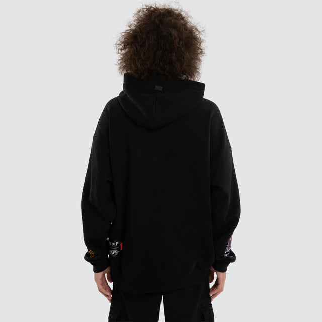 Model wears Ben Davis Adelaide Crows AFL Box Fit Hoodie Jet Black Hoodies in Black - Image 5