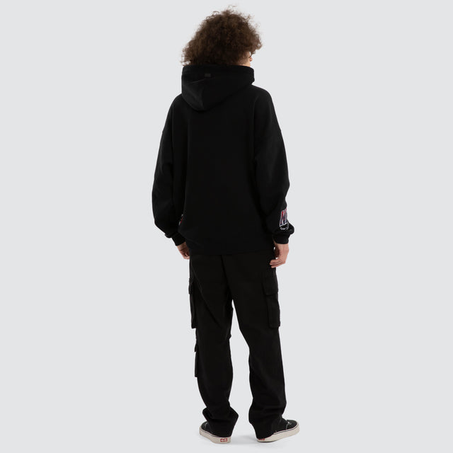 Model wears Ben Davis Adelaide Crows AFL Box Fit Hoodie Jet Black Hoodies in Black - Image 6