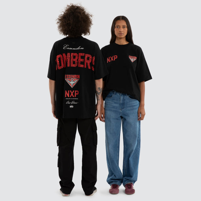 Model wears Ben Davis Essendon Bombers AFL Raptor Tee Jet Black T-Shirts in Black - Image 4