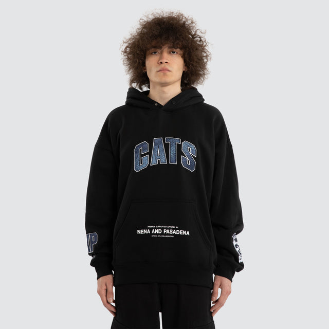 Model wears Ben Davis Geelong Cats AFL Box Fit Hoodie Jet Black Hoodies in Black - Image 2